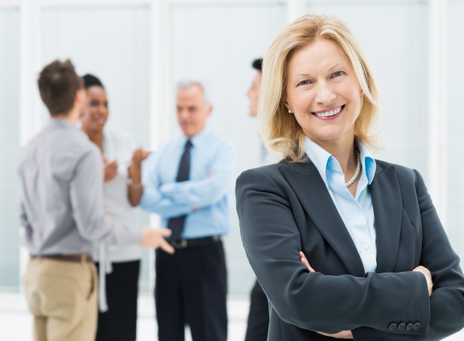 Businesswoman with Her Employees							